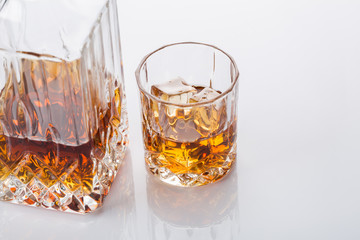 Glass and bottle of hard liquor scotch whisky