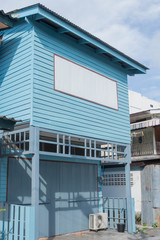 blue house in village