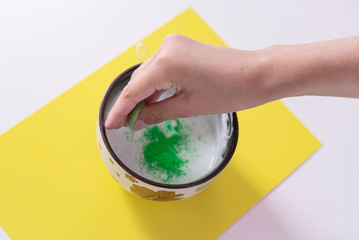 a girl making slime herself