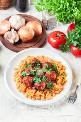 Meatballs with red rice