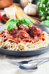 Spaghetti pasta with meatballs and tomato sauce