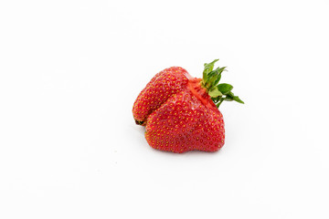 Fresh Strawberry. Imperfect Vegetable. Raw Organic Fruit Closeup Isolated on White. Sweet Red Natural Berry. Vegetarian Nutrition Breakfast Ingredient. Strage Ugly Vitamin Fruit. Fresh and Delicious