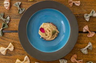 Fototapeta premium Italian gourmet pasta spaghetti. Delicious Mediterranean cuisine. High end italian food