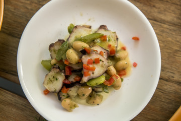 Delicious Salad with squid and octopus. Healthy eating concept