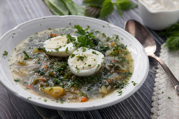 Nettle soup with sorrel in a plate