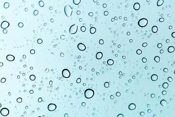 Raindrops on window glasses surface , Natural Pattern of raindrops.