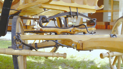 Old horse carriage front wheel axle