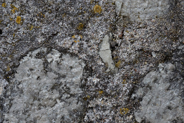 stone texture with splashes of black and light shades of a stone similar to granite.