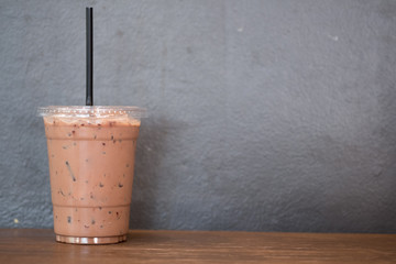 Close up iced mocha coffee in takeaway cup