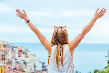 Young woman traveling through Europe, Cinque Terre, Italy