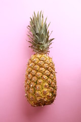 Delicious pineapple on colorful background