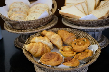 Close up bread and pastry in the bamboo basket