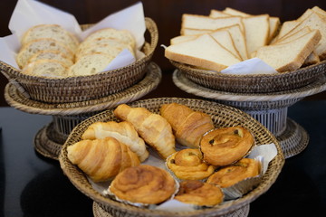 Close up bread and pastry in the bamboo basket