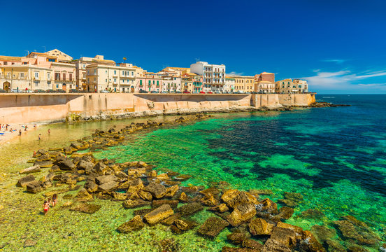 Cityscape of Ortygia. City beach in the historical center of Syracuse, famous place on Sicily, Italy