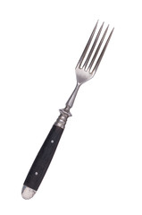Beautiful old vintage fork isolated on white background. Top view. Retro silverware.
