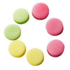Obraz premium French macaroons in a circle isolated on white background