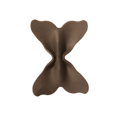 One bow tie pasta wheat semolina with squid ink isolated on white background