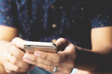 Close up of man hands using mobile smartphone, Technology lifestyle concept. Selective focus