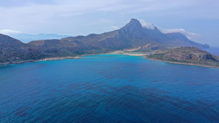 Aerial drone bird's eye view photo of tropical caribbean paradise bay and lagoon with white sandy beach and turquoise clear sea