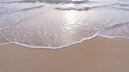 Fototapeta na wymiar Soft wave of ocean on sandy beach-phuket