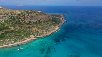 Aerial drone bird's eye view photo of tropical caribbean paradise bay and lagoon with white sandy beach and turquoise clear sea