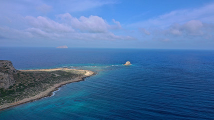 Aerial drone bird's eye view photo of tropical caribbean paradise bay and lagoon with white sandy beach and turquoise clear sea