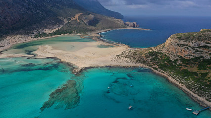 Aerial drone bird's eye view photo of tropical caribbean paradise bay and lagoon with white sandy beach and turquoise clear sea