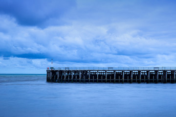 Wooden jetty with beacon in Aberystwyth Wales UK
