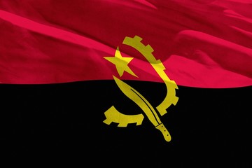 Waving Angola flag for using as texture or background, the flag is fluttering on the wind