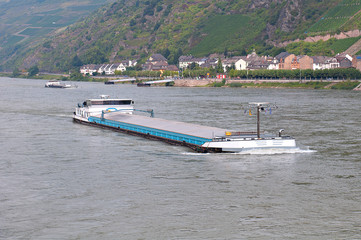 Obraz premium Barge with cargo on the river.