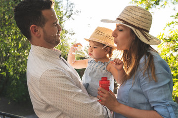 Obraz premium Happy Hispanic Family Having Fun Together Outdoors.