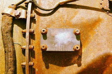 Steampunk vintage jet engine. Unusual old aircraft technology. Engine parts of a jet plane. Vintage engine with tubes and hoses.