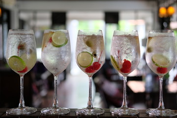 summer drinks of gin tonic alcoholic cocktails on table