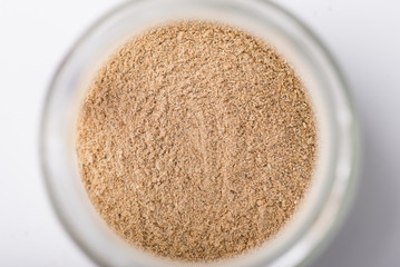 Closeup of dry cardamom in jar