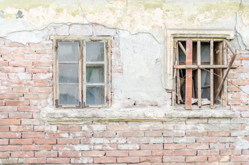 The windows of abandoned dilapidated house