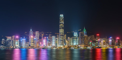 Panorama of Victoria harbor of Hong Kong city at night