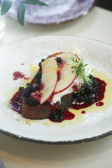 Cream cheese, berries and pear toast
