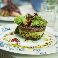 Healthy avo burger with beef and salad