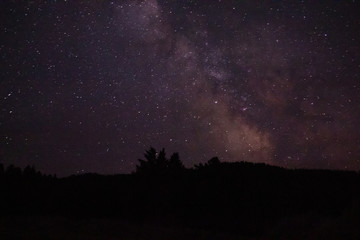 Naklejka na ściany i meble Milky way galaxy night sky mountain landscape
