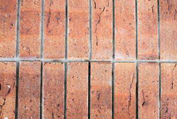 Old brick wall, old texture of red stone blocks closeup