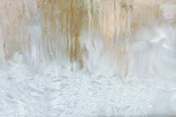 Frosty patterns on a frozen ice box in the early morning