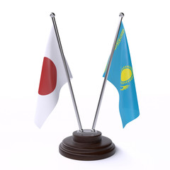 Japan and Kazakhstan, two table flags isolated on white background. 3d image