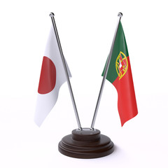 Japan and Portugal, two table flags isolated on white background. 3d image