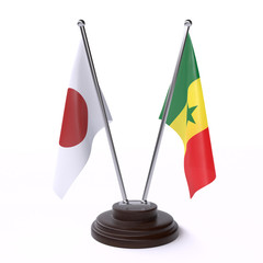 Japan and Senegal, two table flags isolated on white background. 3d image