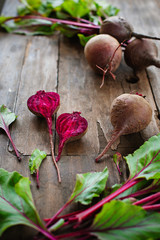 Bunch of fresh organic beetroot on wooden background. Concept of diet, raw, vegetarian meal. Farm, rustic and country style