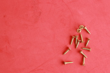 golden star screws, in colorful background