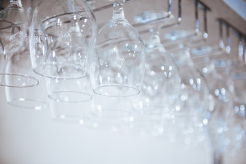 Stylish light background. Blurred glasses with bokeh