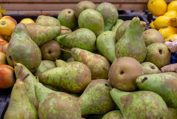 Fresh green-brown pears for sale at  at Wroclaw Market Hall 