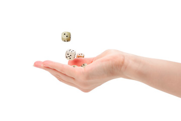 Woman throws dices isolated on white.