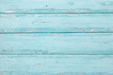 wooden horizontal boards painted blue. blue wooden background